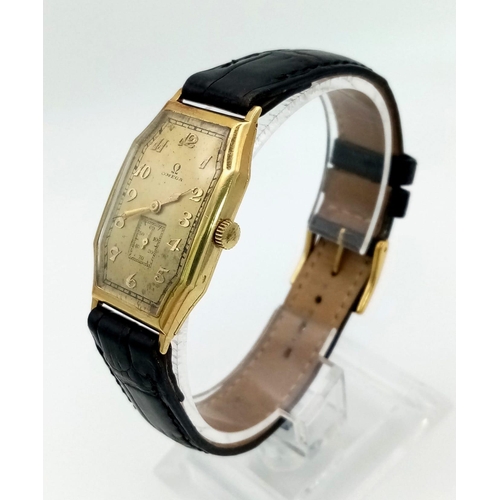 401 - A Vintage Omega Gold Ladies Watch. Black leather strap. Gold rectangular case - 22 x 32mm. Gold tone... 