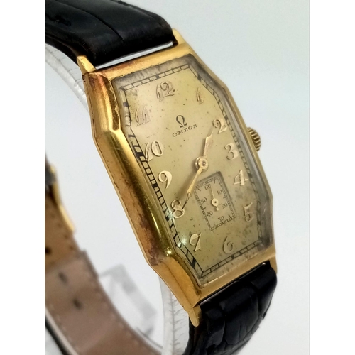 401 - A Vintage Omega Gold Ladies Watch. Black leather strap. Gold rectangular case - 22 x 32mm. Gold tone... 