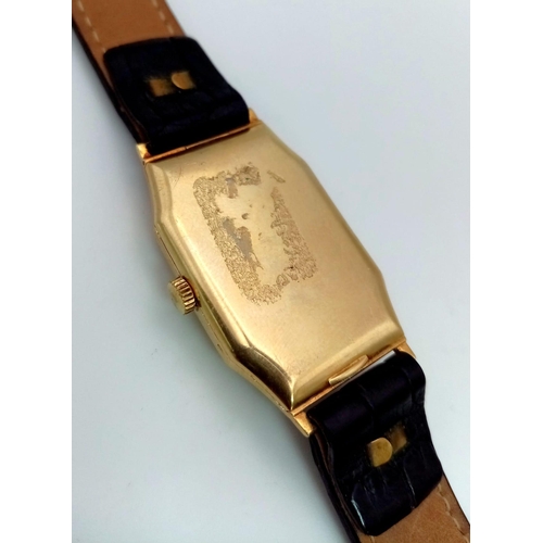 401 - A Vintage Omega Gold Ladies Watch. Black leather strap. Gold rectangular case - 22 x 32mm. Gold tone... 