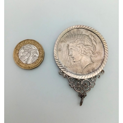 130 - An Excellent Condition 1922 American Silver Dollar Silver Mounted to a Pendant. 32.34 Grams