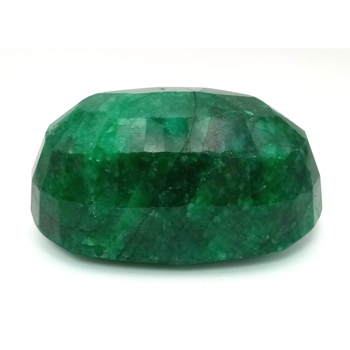 415 - A 1524ct Massive Brazilian Oval-Shaped Emerald. 8 x 5.5 x 4cm. Comes in a hexagonal presentation box... 