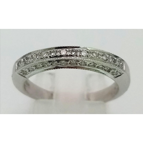 424 - 9k white gold diamond set half eternity ring with diamonds also set on sides (dia: 0.18ct), size N, ... 