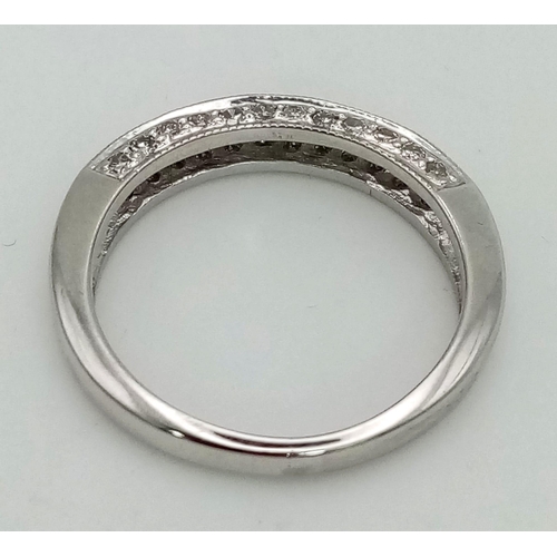 424 - 9k white gold diamond set half eternity ring with diamonds also set on sides (dia: 0.18ct), size N, ... 