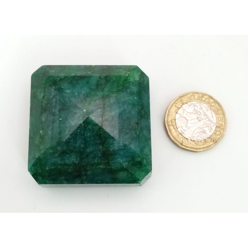 478 - A 420ct Faceted Natural Brazilian Huge Emerald. Square-step cut. 4 x 4cm.