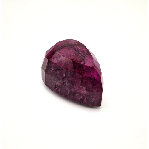 501 - An Immense 2216ct Faceted Pear-Shaped Natural African Ruby Gemstone. Comes with a GLI certificate in... 