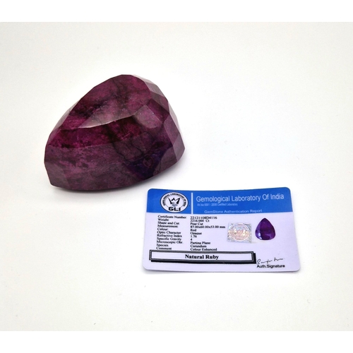 501 - An Immense 2216ct Faceted Pear-Shaped Natural African Ruby Gemstone. Comes with a GLI certificate in... 