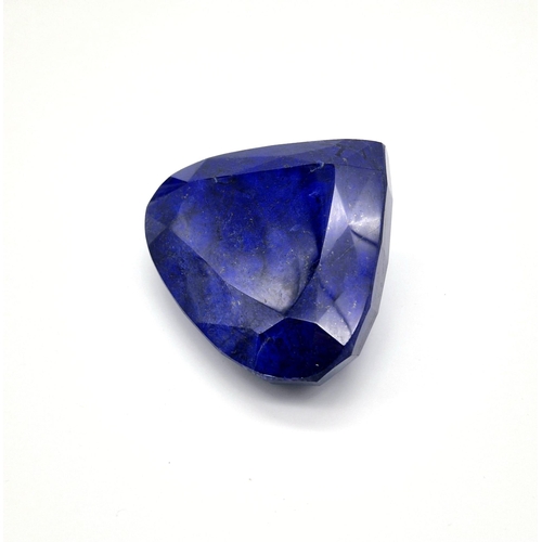 65 - Unleash the Kraken! A 3926ct African Earth Mined Blue Sapphire. Trillion-Shaped with a GLI certifica... 