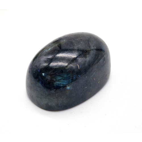 690 - A Huge 1830ct Labradorite Oval Cabochon. Dark green with colour-play. Comes with a GLI certificate a... 