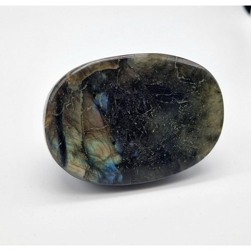 690 - A Huge 1830ct Labradorite Oval Cabochon. Dark green with colour-play. Comes with a GLI certificate a... 