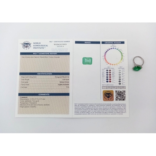 149 - A 950 Platinum 6.19ct Colombian Emerald and Diamond Ring. Octagonal mixed cut emerald with a diamond... 