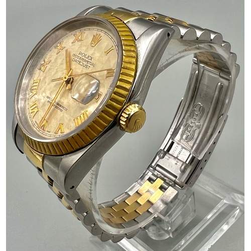 319 - A Rolex Oyster Datejust Bi-Metal Gents Watch. Bi-metal strap and case - 36mm. Cream geometric patter... 