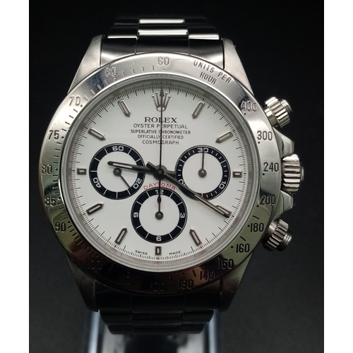 57 - A Rolex Daytona Cosmograph Gents Watch. Stainless steel strap and case - 40mm. White dial with three... 