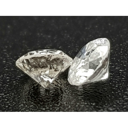 687 - PAIR OF ROUND BRILIANT CUT DIAMONDS TOTAL WEIGHT 0.33CT