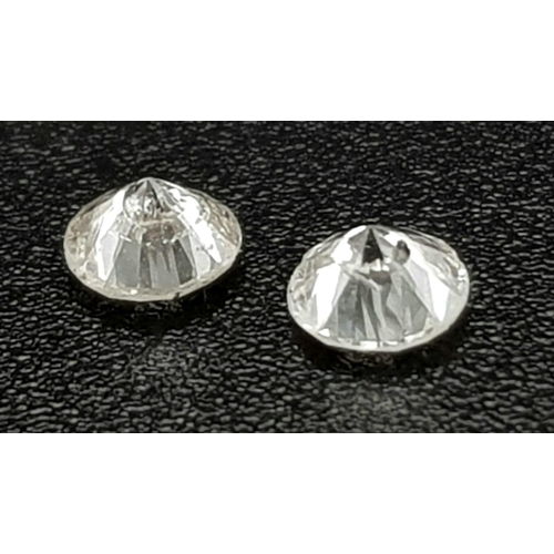 687 - PAIR OF ROUND BRILIANT CUT DIAMONDS TOTAL WEIGHT 0.33CT