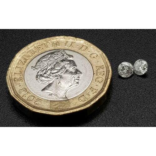 687 - PAIR OF ROUND BRILIANT CUT DIAMONDS TOTAL WEIGHT 0.33CT