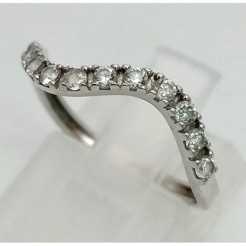 759 - 18k white gold wave shaped half eternity ring set with 11 CZ stones, Total Weight 1.2g, size M