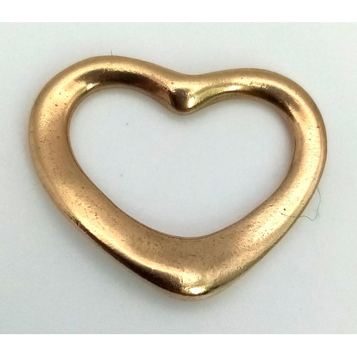 807 - 9k yellow gold Tiffany style open heart pendant. Weighs 2.2g