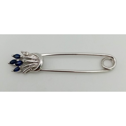 493 - A Vintage 18K White Gold, Sapphire and Diamond Safety Pin Brooch. 4.5cm. 3.38g total weight