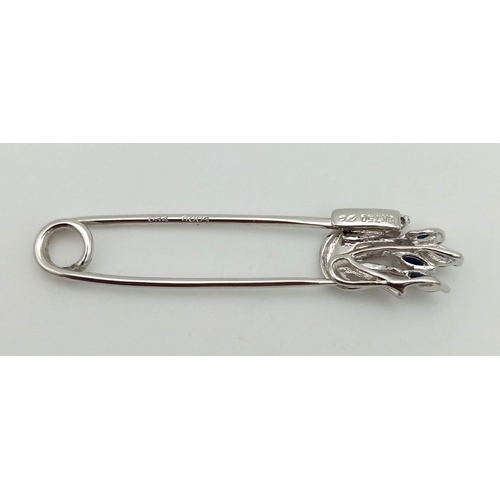 493 - A Vintage 18K White Gold, Sapphire and Diamond Safety Pin Brooch. 4.5cm. 3.38g total weight