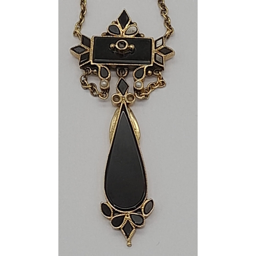 682 - A 9K Yellow Gold Onyx and Pearl Pendant on a 9K Yellow Gold Necklace with Pearl Drops. 5cm and 40cm.... 