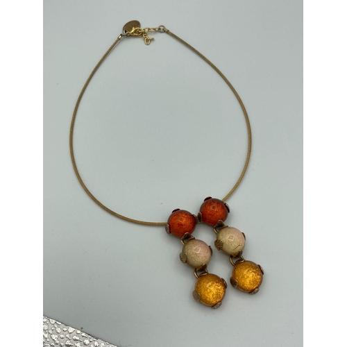 111 - Rare Vintage ISAKY of PARIS NECKLACE. This signature piece by ISAKY he has two rows of yellow, clear... 