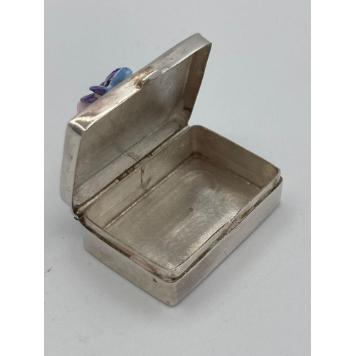 132 - Vintage SILVER PILL BOX having full UK hallmark and set with ceramic floral Posey to top. Excellent ... 