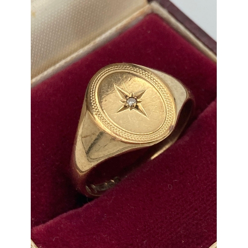 20 - 9 carat GOLD SIGNET RING with centre Diamond detail.  4.4 grams. Size T 1/2.