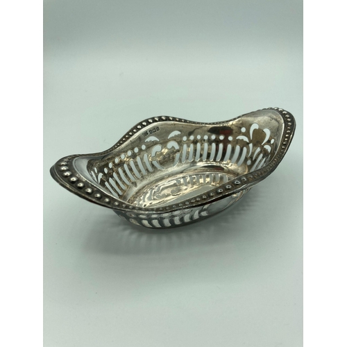 204 - Antique SILVER BON BON DISH in attractive openwork basket form. Hallmark for Robert Pringle, Birming... 