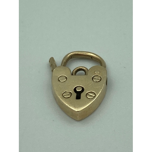 279 - Hallmarked 9 carat GOLD HEART PADLOCK CHARM. 1.31 grams.