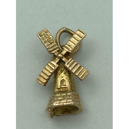 6 - 9 carat GOLD WINDMILL CHARM having full UK Hallmark. 1.27 grams.