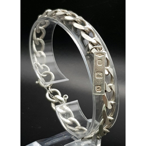 1113 - A 925 Silver Flat Curb Link Bracelet with Hanging 925 Silver Ingot. 25mm and 20cm. 26.12g