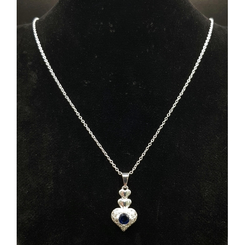 1194 - A 925 Silver Disappearing Necklace with a Blue and White Stone Pendant set in 925 Silver. 48cm and 3... 