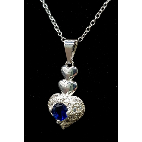 1194 - A 925 Silver Disappearing Necklace with a Blue and White Stone Pendant set in 925 Silver. 48cm and 3... 