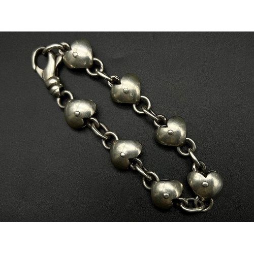 390 - SILVER FANCY HEARTS BRACELET 35G