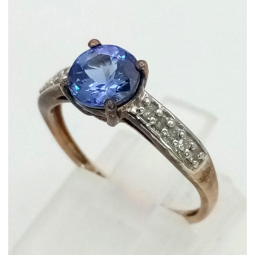 229 - 9K YELLOW GLD DIAMOND & BLUE STONE SET RING 2G SIZE N