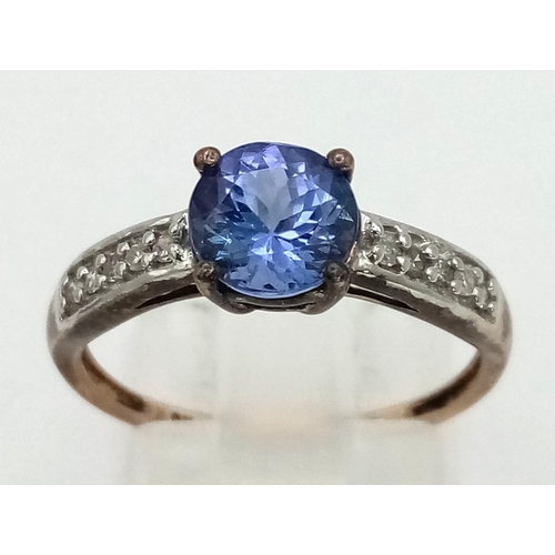 229 - 9K YELLOW GLD DIAMOND & BLUE STONE SET RING 2G SIZE N