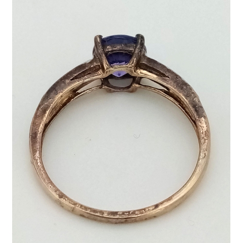 229 - 9K YELLOW GLD DIAMOND & BLUE STONE SET RING 2G SIZE N