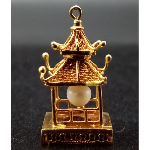 508 - 14K YELLOW GOLD ORIENTAL CHINESE TEMPLE CHARM 2G