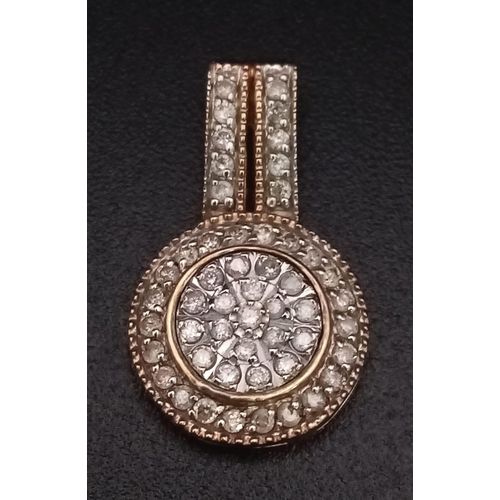 746 - 9K YELLOW GOLD DIAMOND SET PENDANT 1.5G