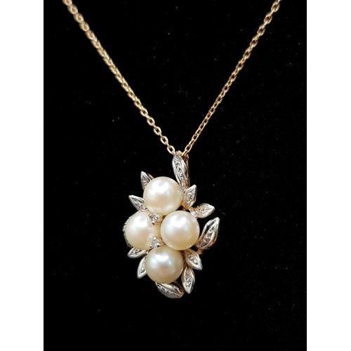 821 - An 18K Gold, Diamond and Pearl Pendant on an 18K Gold Necklace. 25mm and 46cm. 3.95g total weight