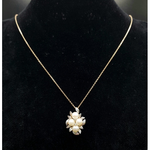 821 - An 18K Gold, Diamond and Pearl Pendant on an 18K Gold Necklace. 25mm and 46cm. 3.95g total weight