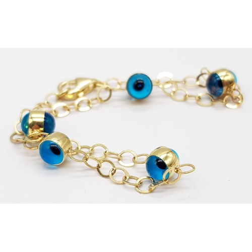 823 - 14K YELLOW GOLD EVIL EYE BRACELET 2.6G