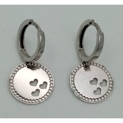 417 - 14k white gold hoop earrings with millgrain edged discs with cut out heart charms, 3g