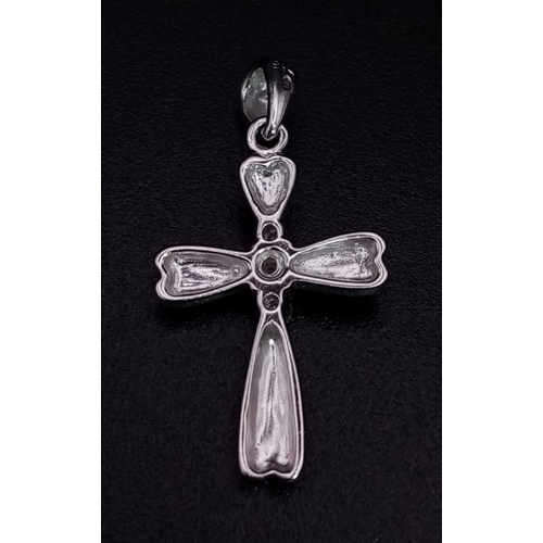 423 - 9K WHITE GOLD DIAMOND SET CROSS 0.9G