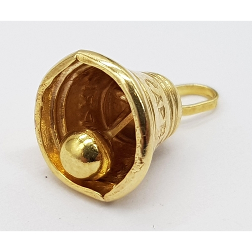 494 - 9K YELLOW GOLD BELL CHARM WITH MOVING PART THAT DINGS INSIDE 0.9G