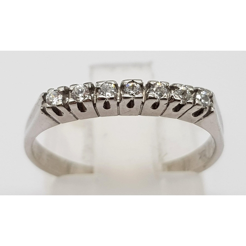 506 - 14K WHITE GOLD DIAMOND SET HALF ETERNITY BAND RING 0.14CT 1.7G SIZE K