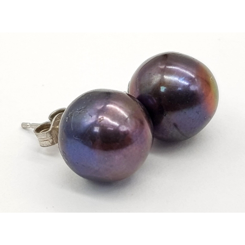 794 - A Pair of 9K Gold Cultured Tahitian Pearl Earrings. 3.41g total weight.