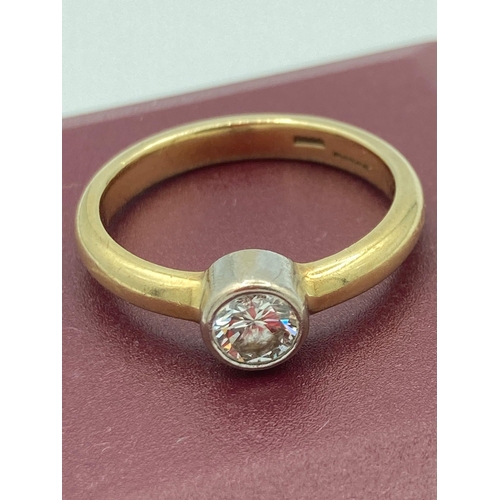 658 - 18 carat GOLD ,DIAMOND SOLITAIRE RING  Having a beautifully cut 
Clear White Diamond (0.50) set to t... 