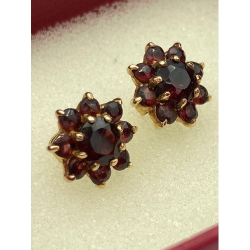 665 - Pair of Garnet set 9 carat GOLD EARRINGS. Full UK hallmark. 2.04 grams.