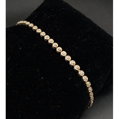 190 - A 9K Yellow Gold Diamond Tennis Bracelet. 20cm. 5.67g total weight.